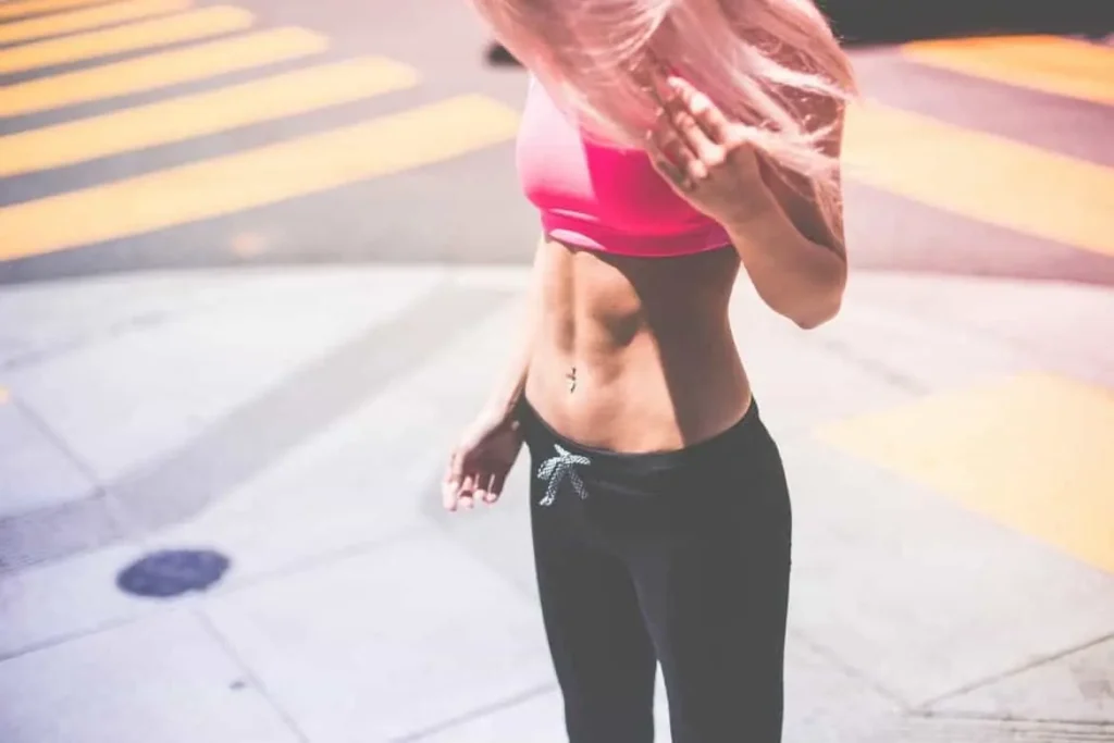 Woman with toned stomach after LA-EMS Body Sculpting Treatment King's Lynn