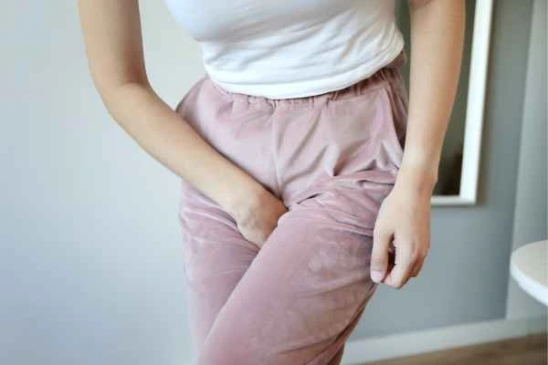 woman running for the toilet because of urinary incontinence King's Lynn